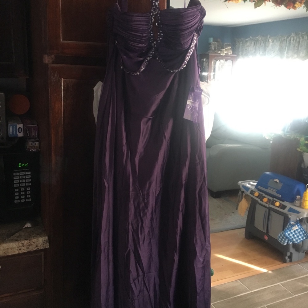 Eggplant NWT floor length gown in halter style